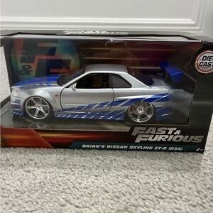 BRIAN'S NISSAN GTR SKYLINE R34 SILVER & BLUE FAST & FURIOUS 1/24 CAR JADA 97158